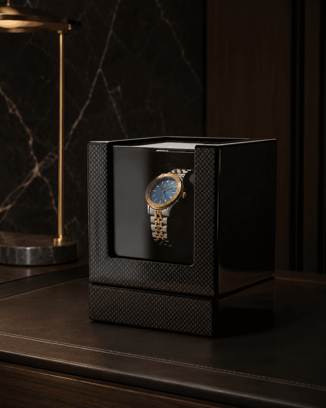 Robert Taylor Brooklands single-module watch winder in carbon fibre with a glass front.