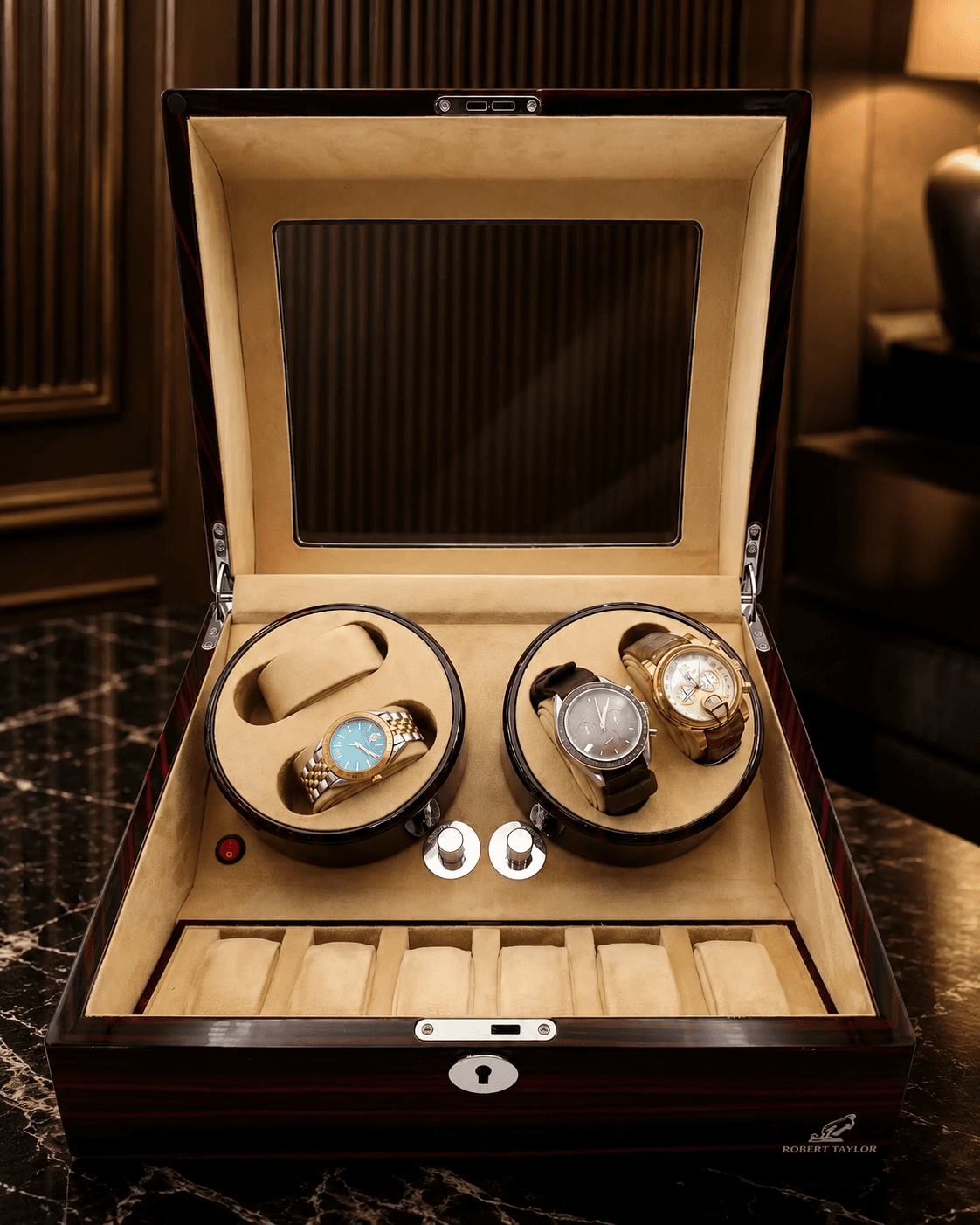 Robert Taylor Brooklands four-module watch winder in piano ebony with cream suede interior.